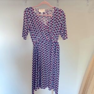 Donna Morgan Geometric print wrap dress. White with navy and pink